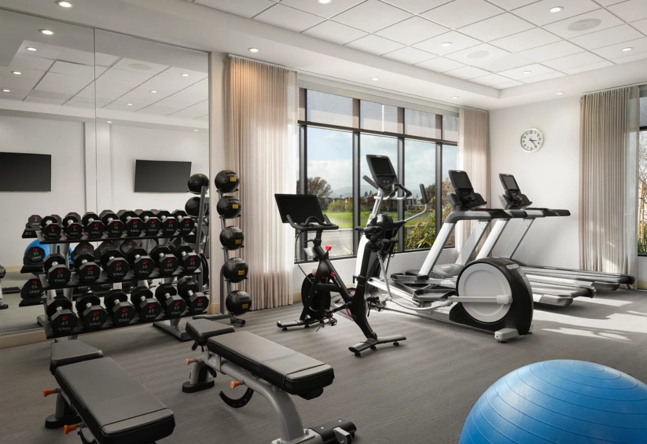 The Knoll fitness center with cardio and weight equipment